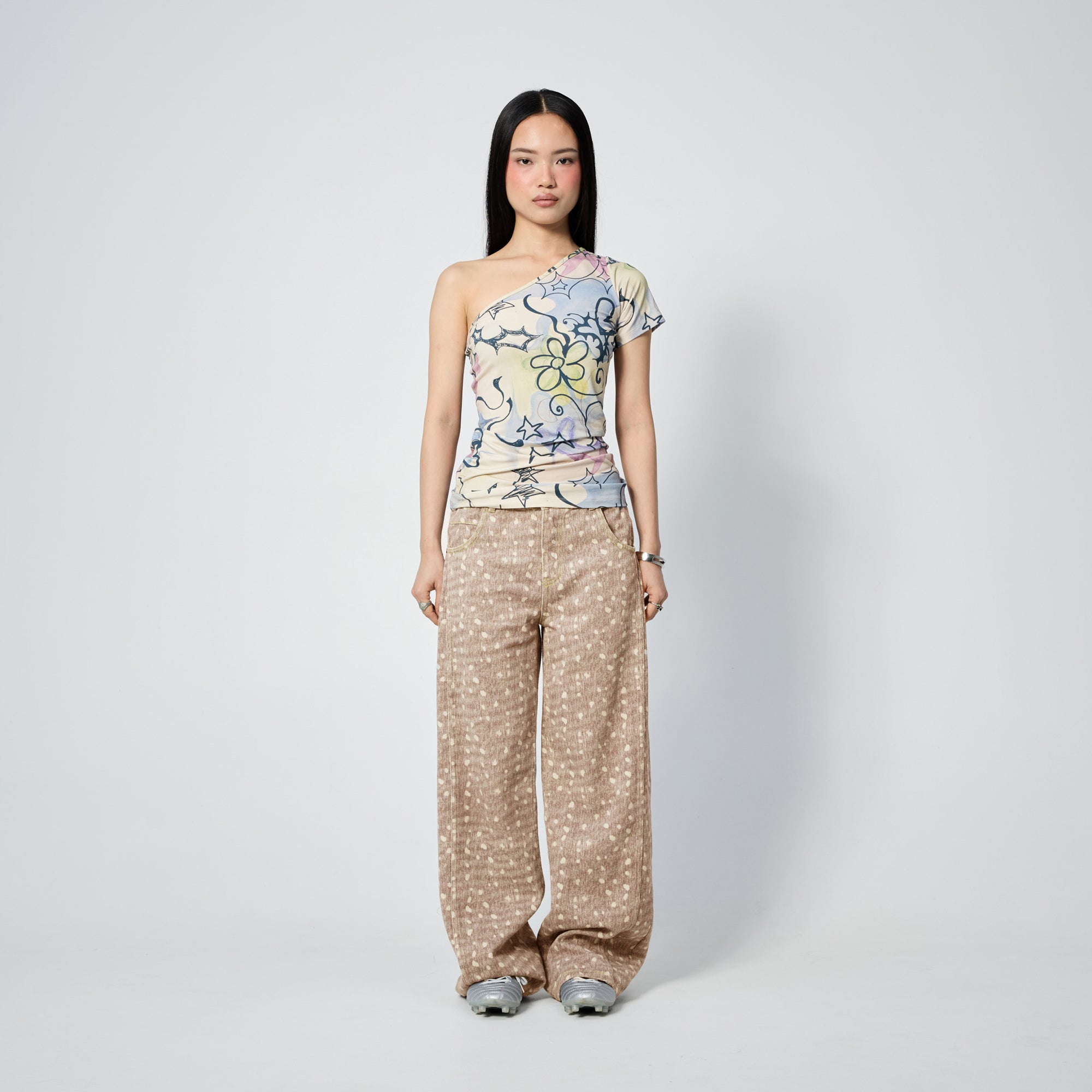 Arthur Apparel light brown straight leg jeans with white spots