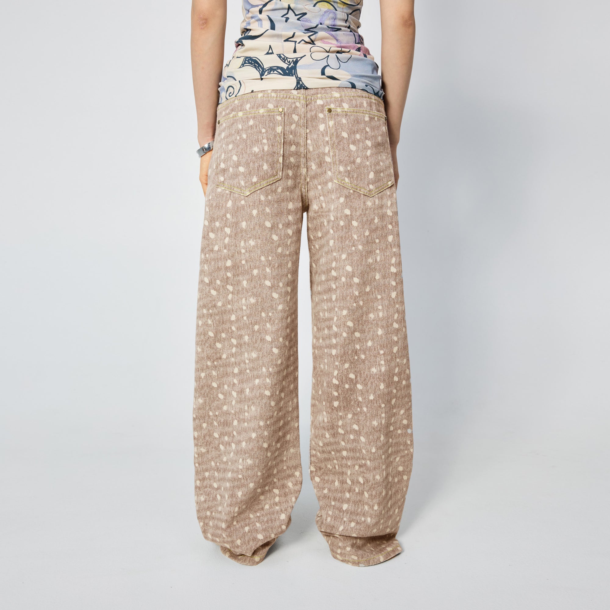 Arthur Apparel light brown straight leg jeans with white spots