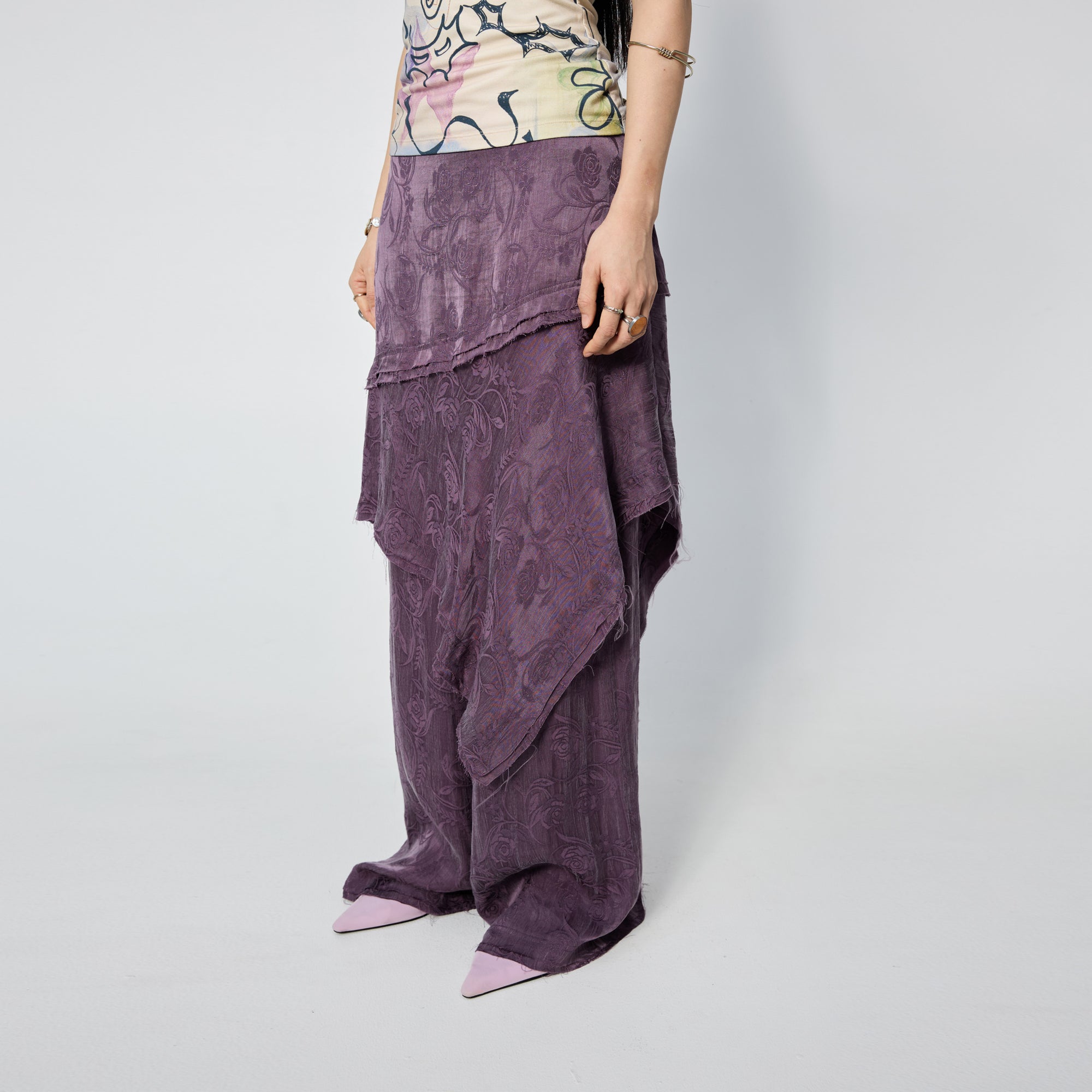 Arthur Apparel purple asymmetric skirt with frayed hem and roses print