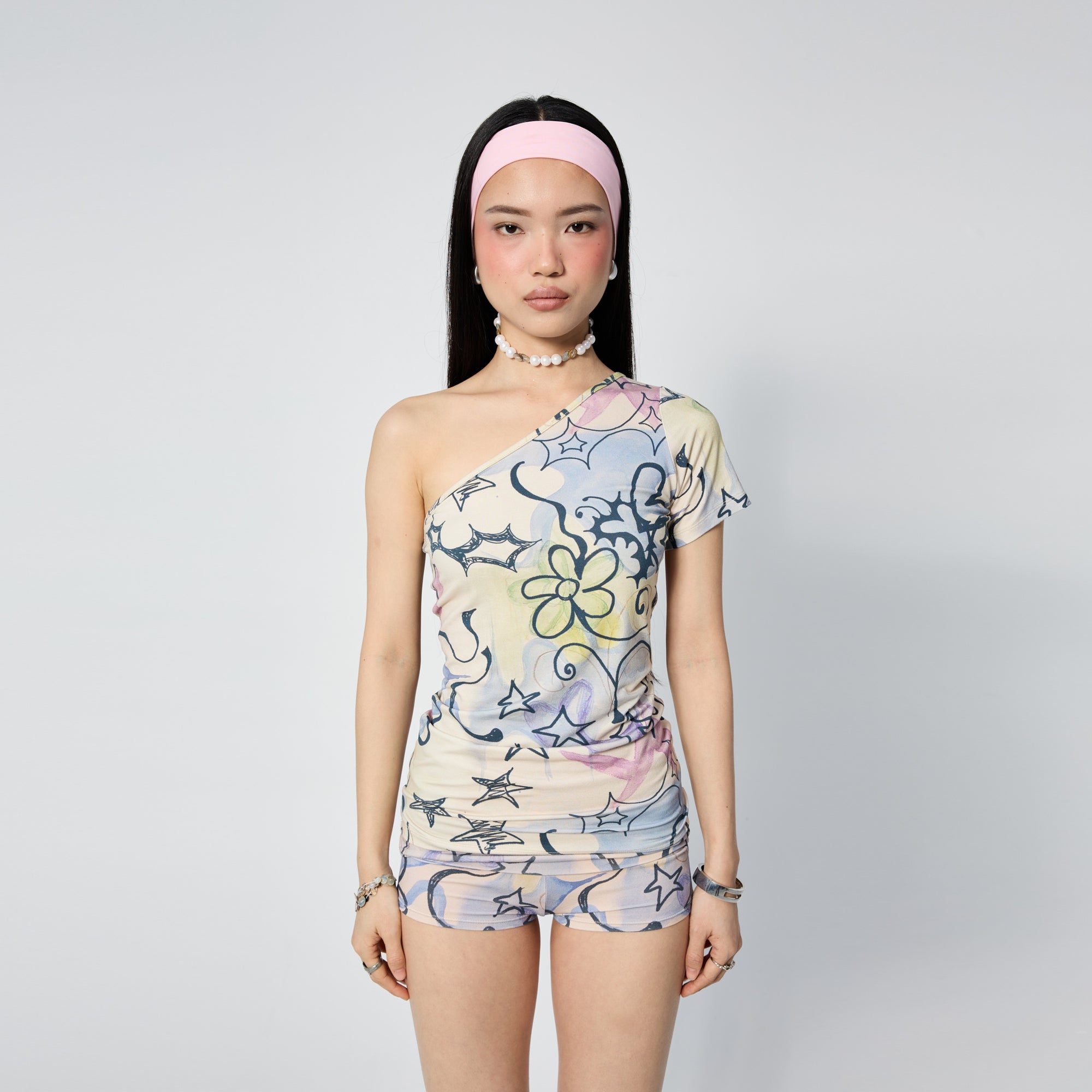 Arthur Apparel fitted asymmetric tee with purple stars print